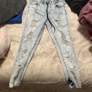 Blue washed jeans skinny ripped 10 dollars original price is 30.00